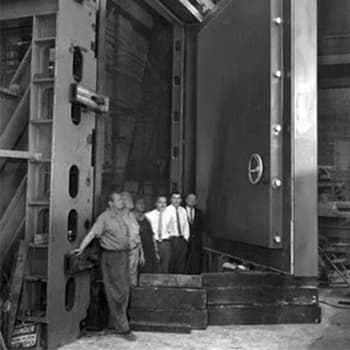 Men inside large bank vault